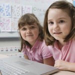 Little girls using a laptop